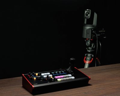 Canon RC-SK5 shown with a PTZ camera on a tripod