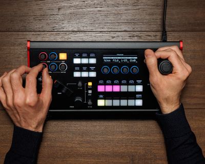 Canon RC-SK5 controller being used with its joystick and dials